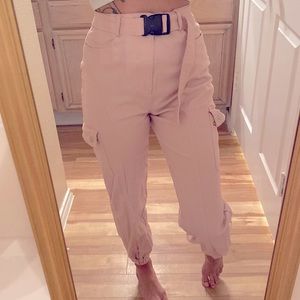 Pink Forever 21 belted cargo pants.